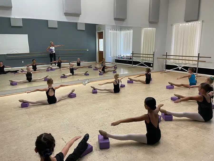 Kids warm up before dance